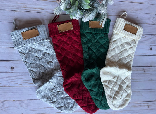 Cable Knit Christmas stockings with leather patch